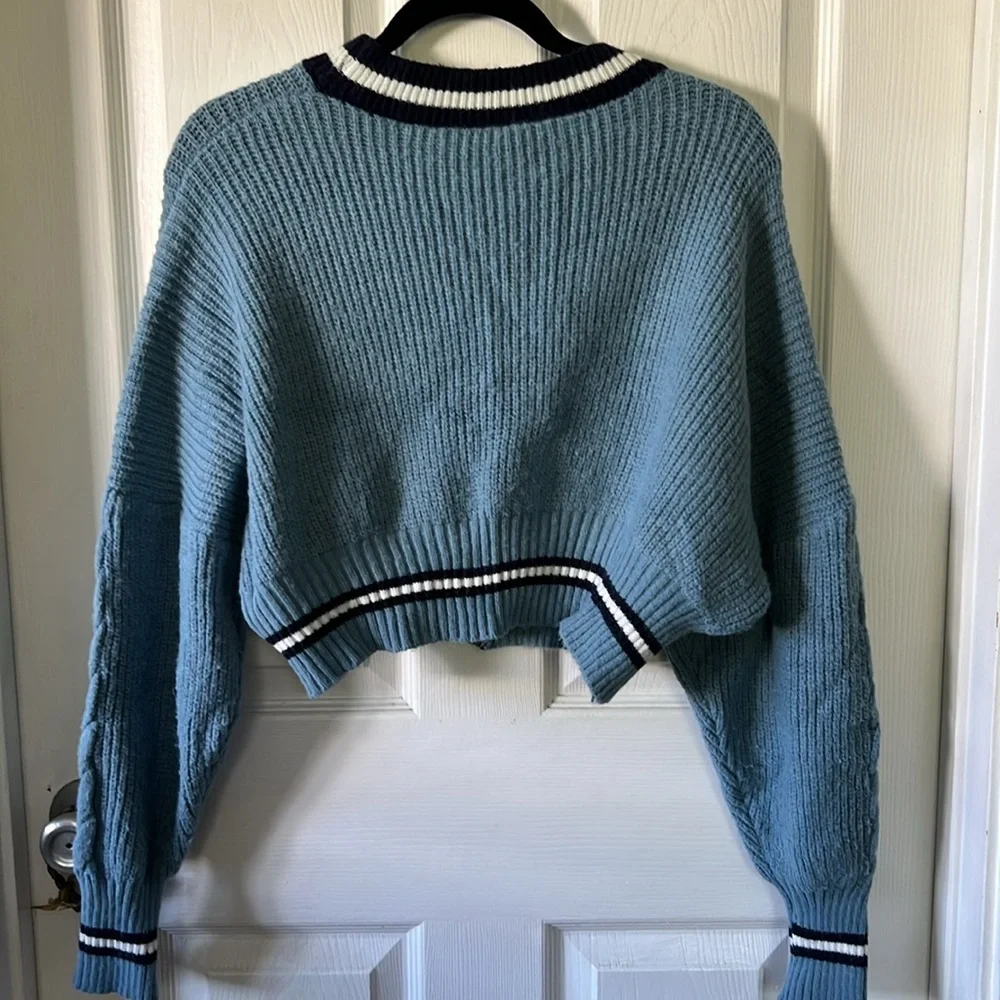 blue buttoned cardigan